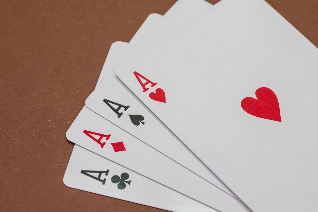 Gaming chips and cards on the table felt